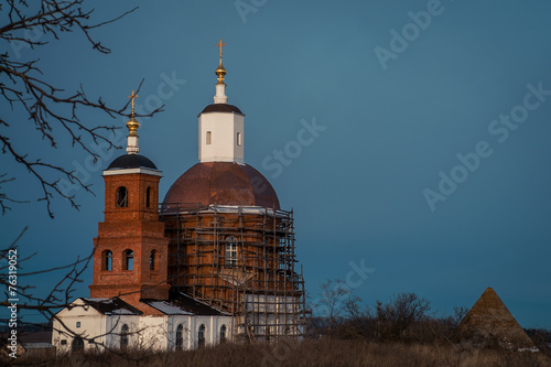 Old Russian church in the ruined fortress photo