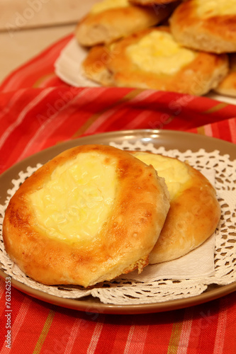 Baked cheesecake with cream cheese on a plate.