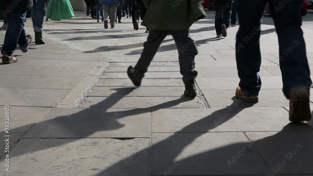 Legs of people on walking on Regent Street in London Legs of people on walking on Regent Street in London