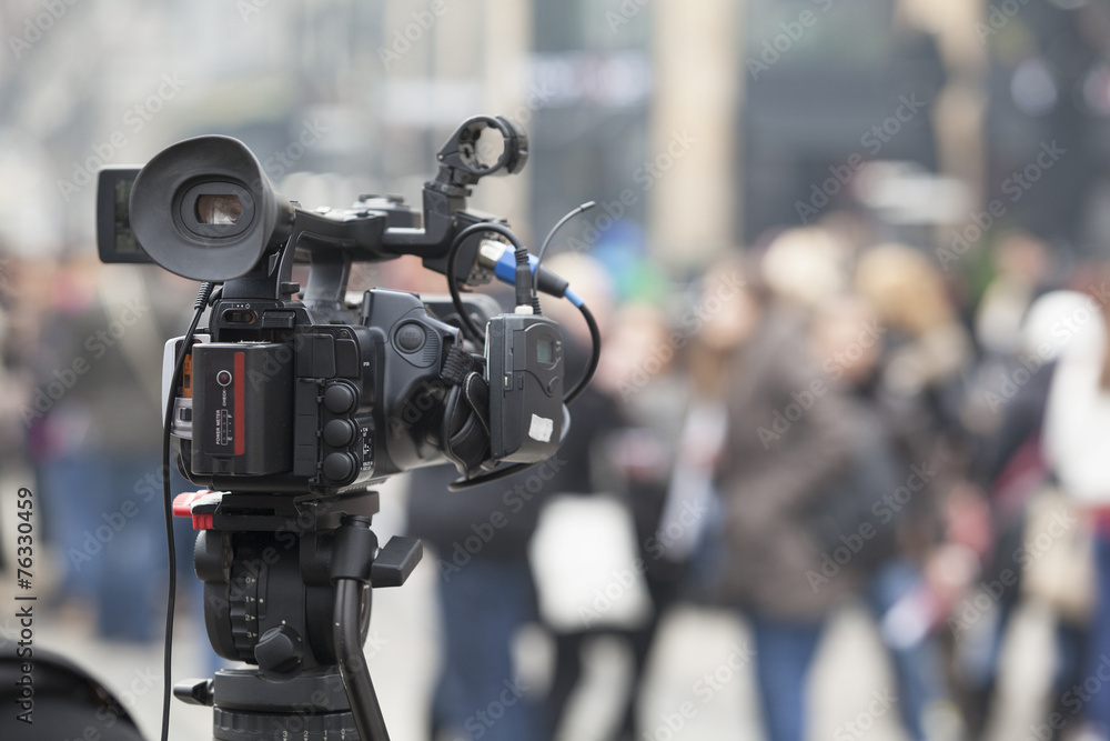 Filming an event with a video camera Filming an event with a video camera