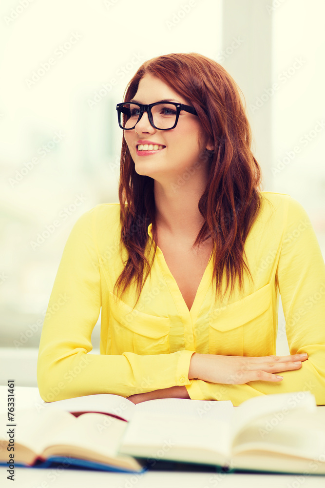 smiling student girl with books in college smiling student girl with books in college