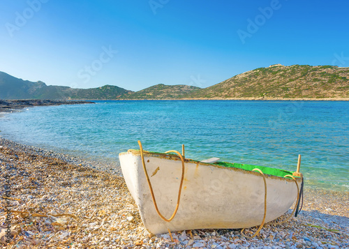 Old fishing boat by the sea in Amorgos island in Greece