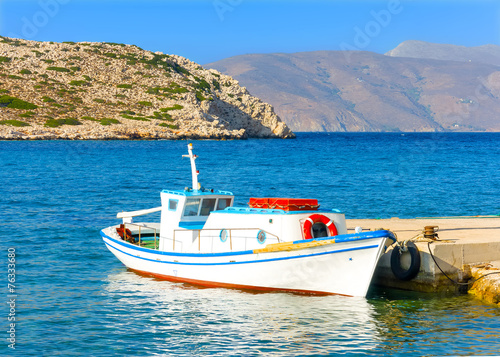 Old fishing boat by the sea in Amorgos island in Greece