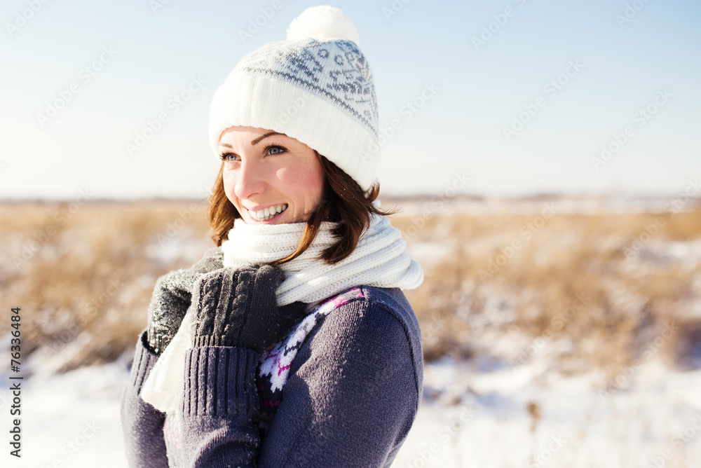 Naklejka premium Portrait of happy young woman have fun at beautiful sunny winter