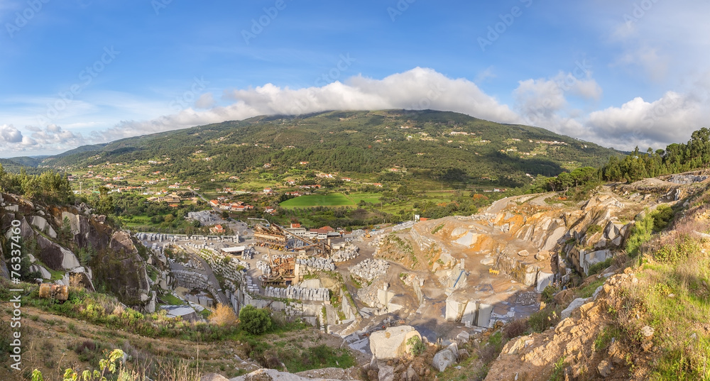 Stone quarry in the mountains. Heavy industry.