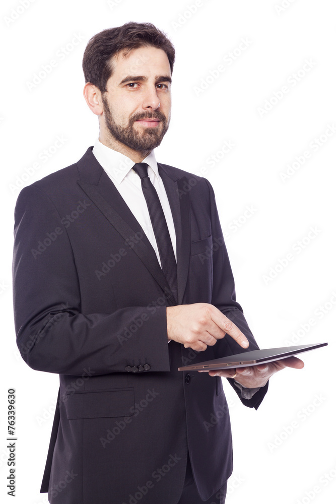 Businessman standing with a tablet computer, isolated on a white Businessman standing with a tablet computer, isolated on a white