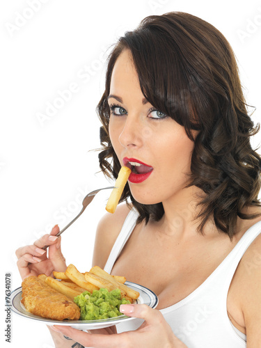 Young Woman Eating Fish and Chips