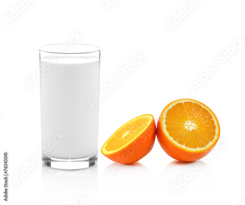 Fresh Glass of Milk and Half of juicy orange isolated on white b