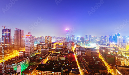 night shanghai skyline with reflection  beautiful modern city