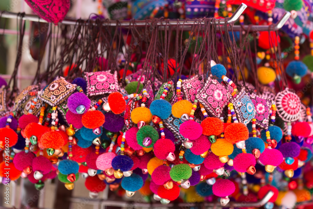 Naklejka premium Colorful yarn keychain in lanna style in market