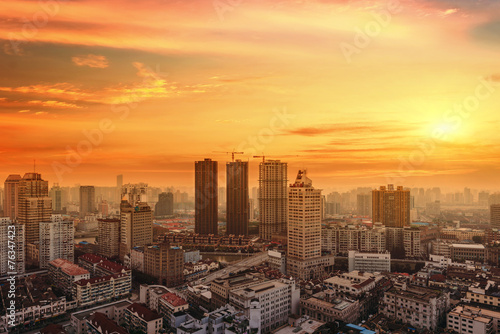 modern city at sunrise,Shanghai skyline © snvv