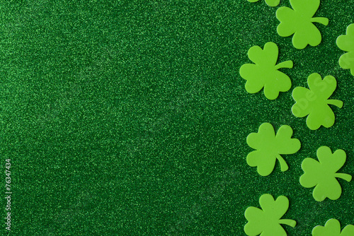 Green Clovers or Shamrocks  on Green Background Background for S
