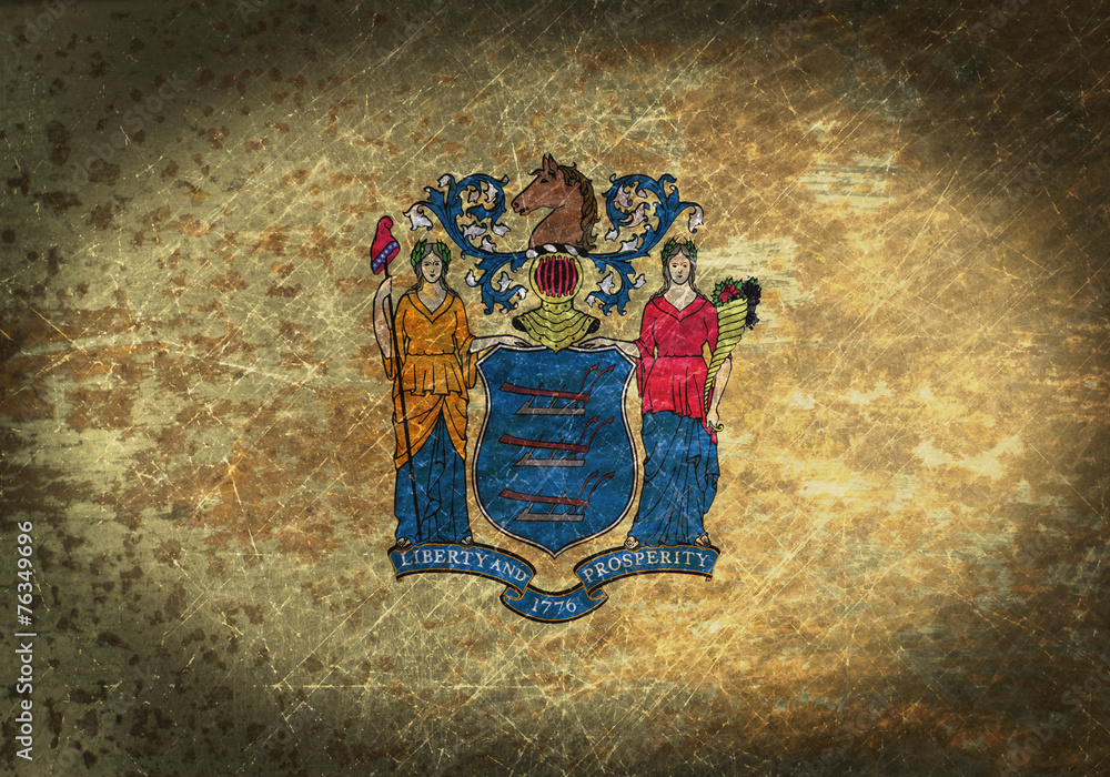 Fototapeta premium Old rusty metal sign with a flag