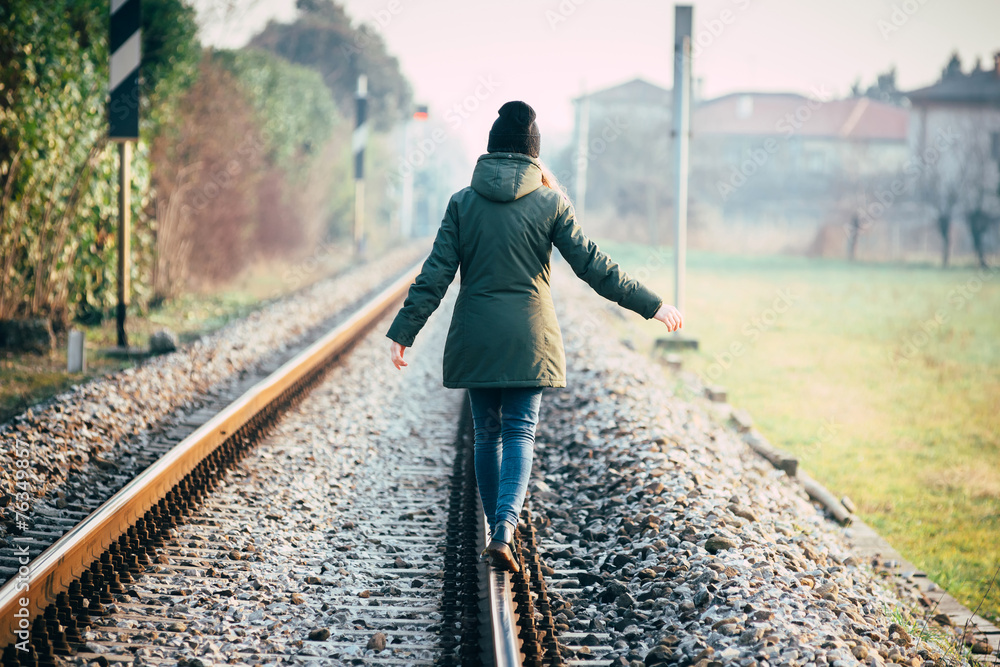 Girl walking on rail Girl walking on rail