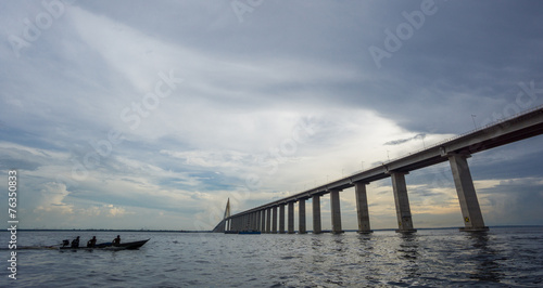 The center of Manaus Iranduba Bridge and boat