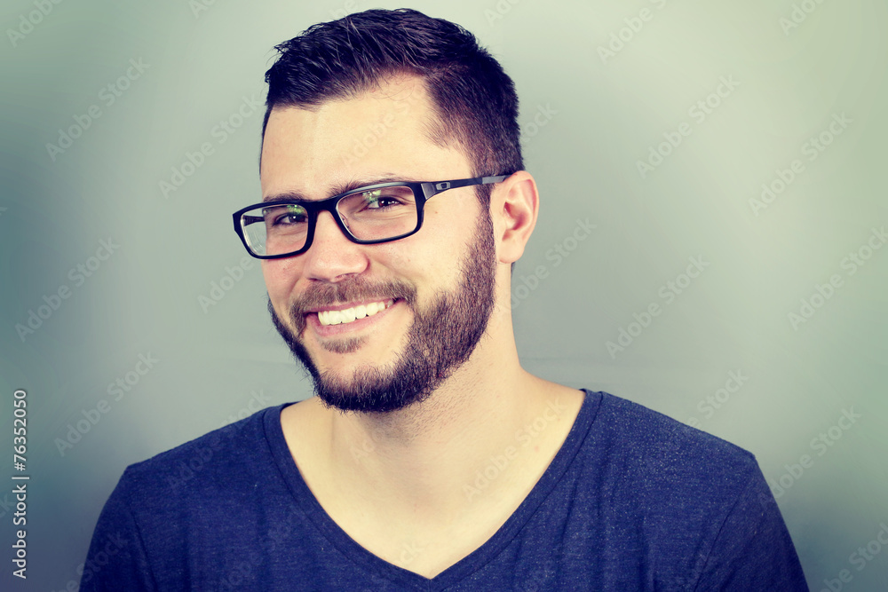 portrait of a businessman smiling shyly portrait of a businessman smiling shyly