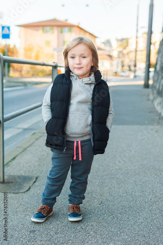 Outdoor portrait of a cute little boy