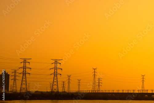 high voltage post.High-voltage tower sky background. © snvv