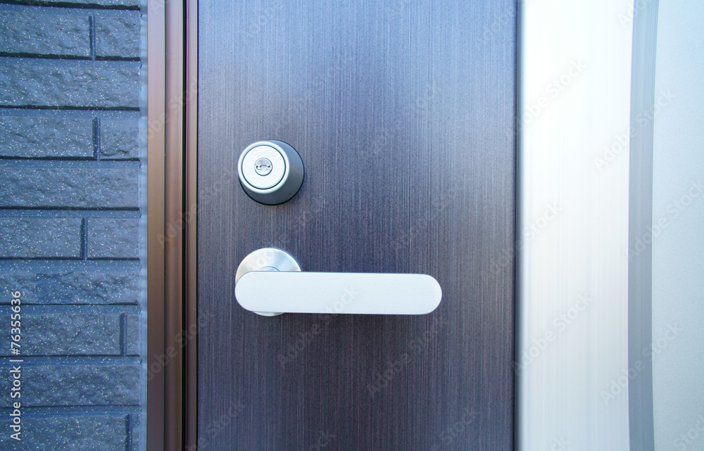 Obraz premium 玄関の鍵穴とノブ