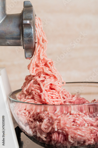Mincer with fresh chopped meat