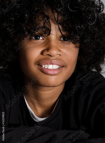 Tableau sur toile Happy African Decent child with Afro hair style