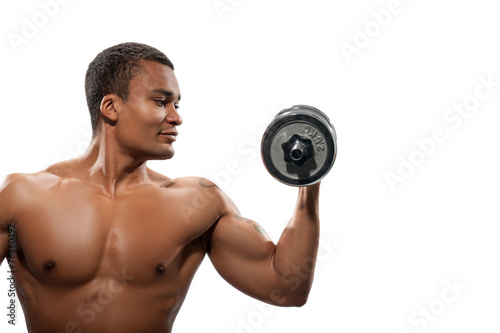 Young African sportsman exercising dumbbell