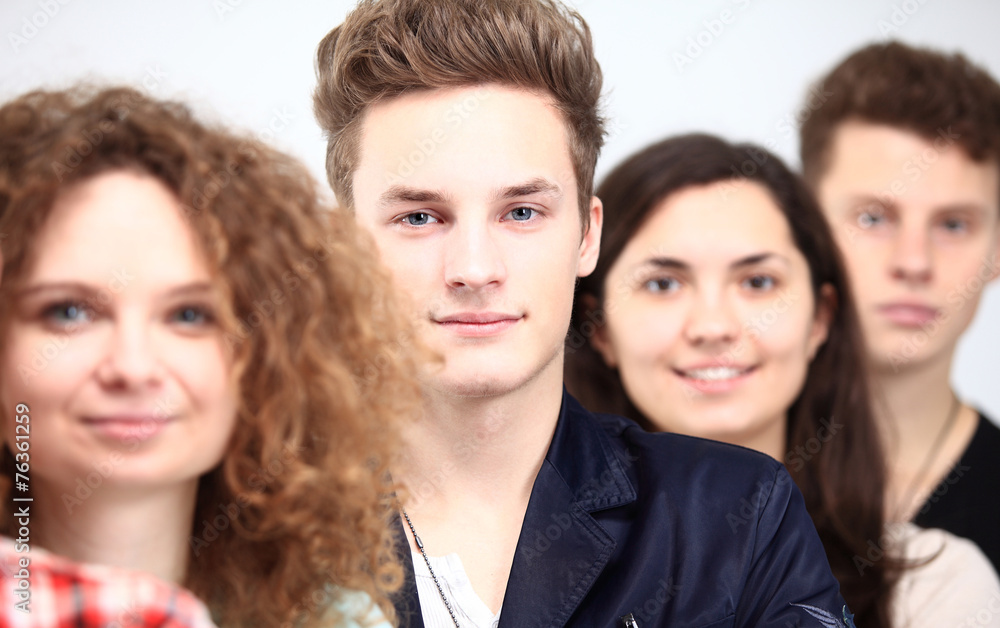Happy Smiling Students Standing In Row Happy Smiling Students Standing In Row