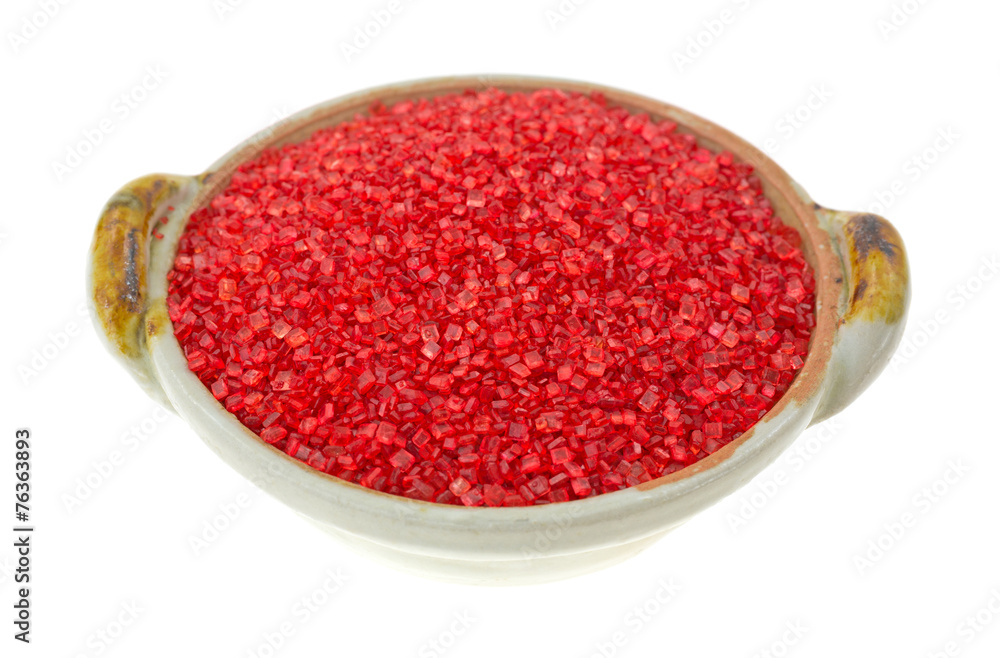 Ruby red candy sprinkles in a bowl Ruby red candy sprinkles in a bowl