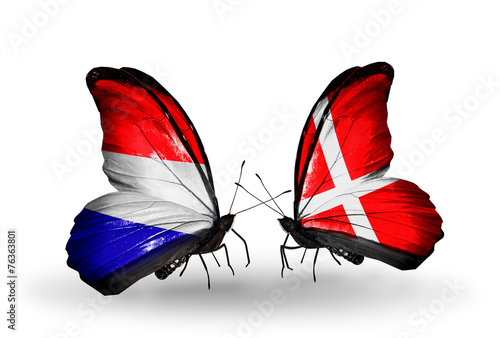 Two butterflies with flags Holland and Denmark