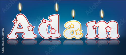 ADAM written with burning candles