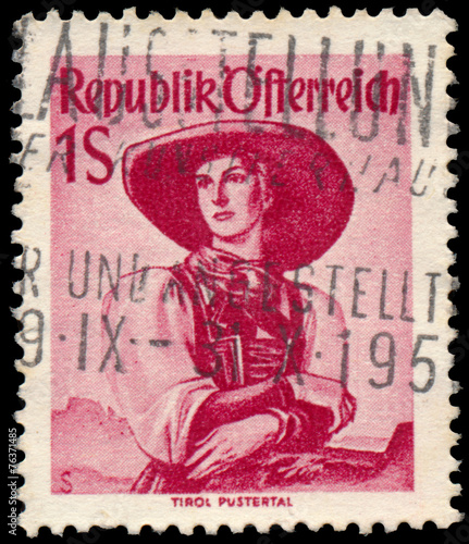 Stamp printed in Austria, shows a woman in national dress, Tirol