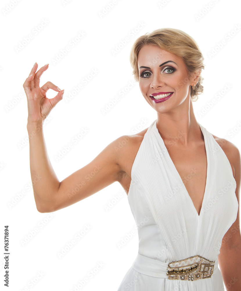 Obraz premium Smiling woman showing ok sign