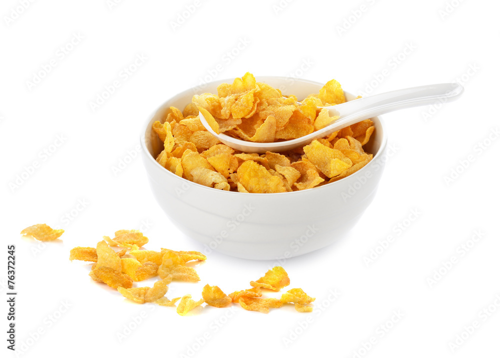 cornflakes in white bowl isolated on white cornflakes in white bowl isolated on white