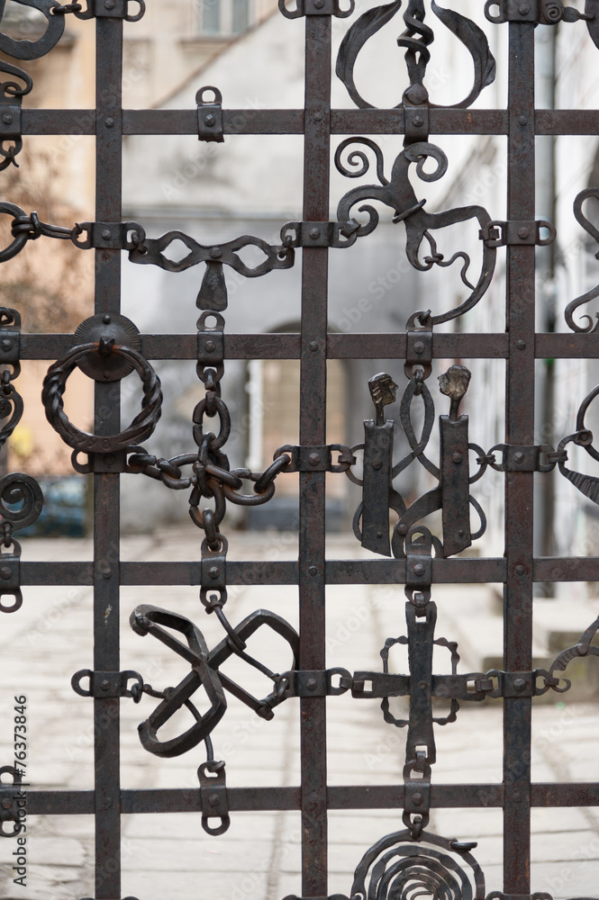 Unique metal gates in old part of historic Lvov, Ukraine Unique metal gates in old part of historic Lvov, Ukraine