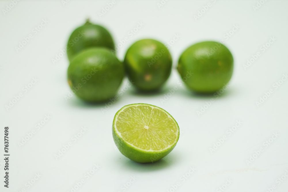 Many limes and half of lime in front
