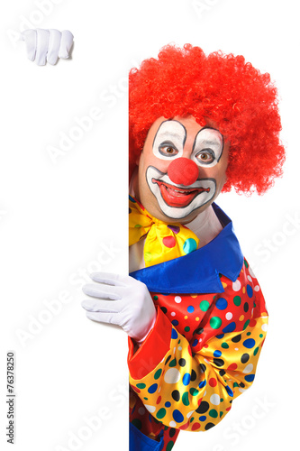 Clown with blank board isolated on white