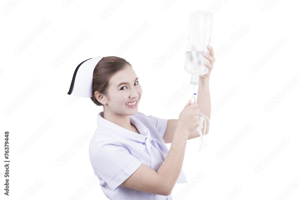 Nurse prepares IV solution for infusion Nurse prepares IV solution for infusion