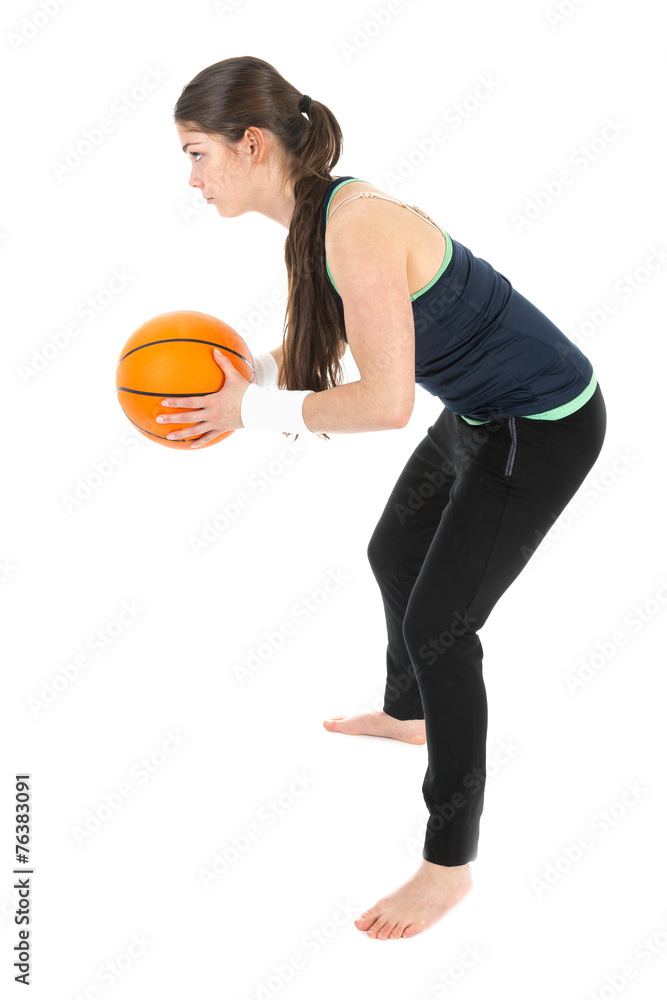 Pretty woman playing basketball, isolated over white Pretty woman playing basketball, isolated over white