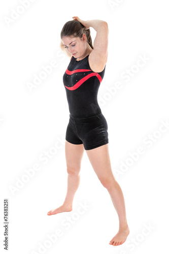 Young woman preparing a gymnastic exercise. isolated over white