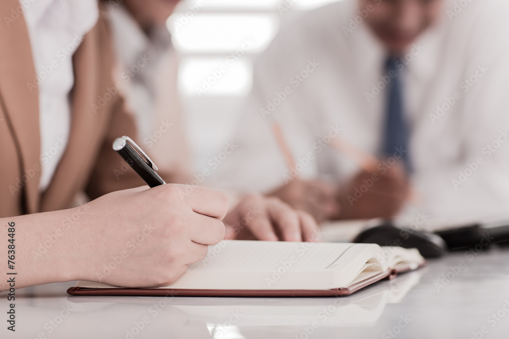 Business people discussing the charts and graphs showing the res Business people discussing the charts and graphs showing the res