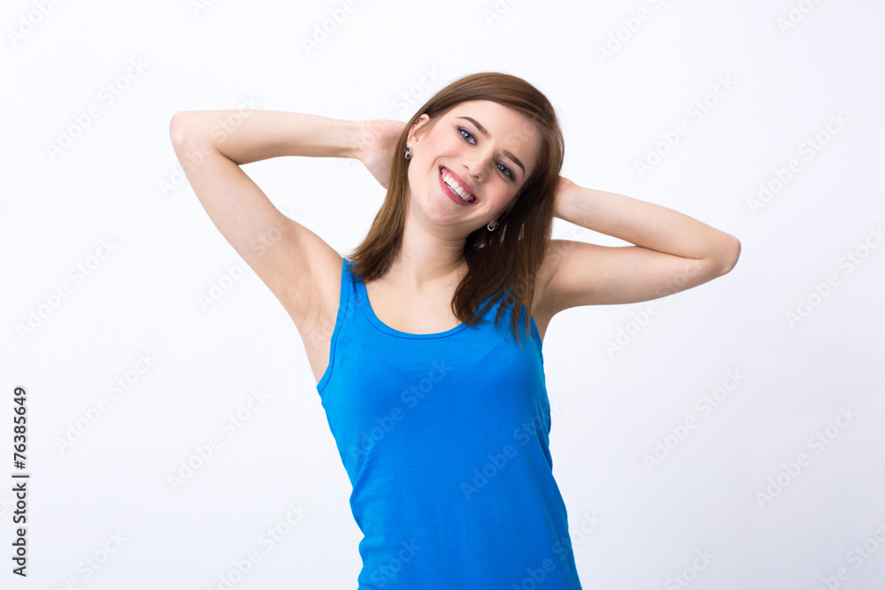 Portrait of a cheerful woman over gray background Portrait of a cheerful woman over gray background