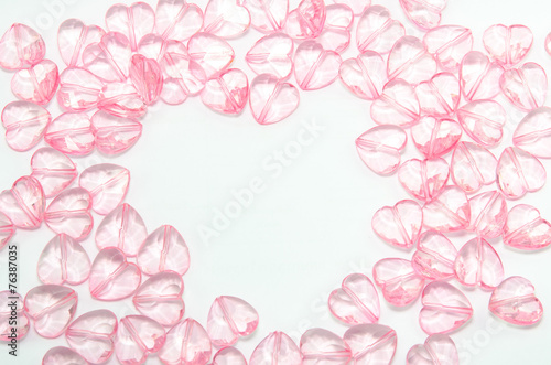 pink hearts glass on white background