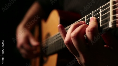 Man playing acoustic guitar