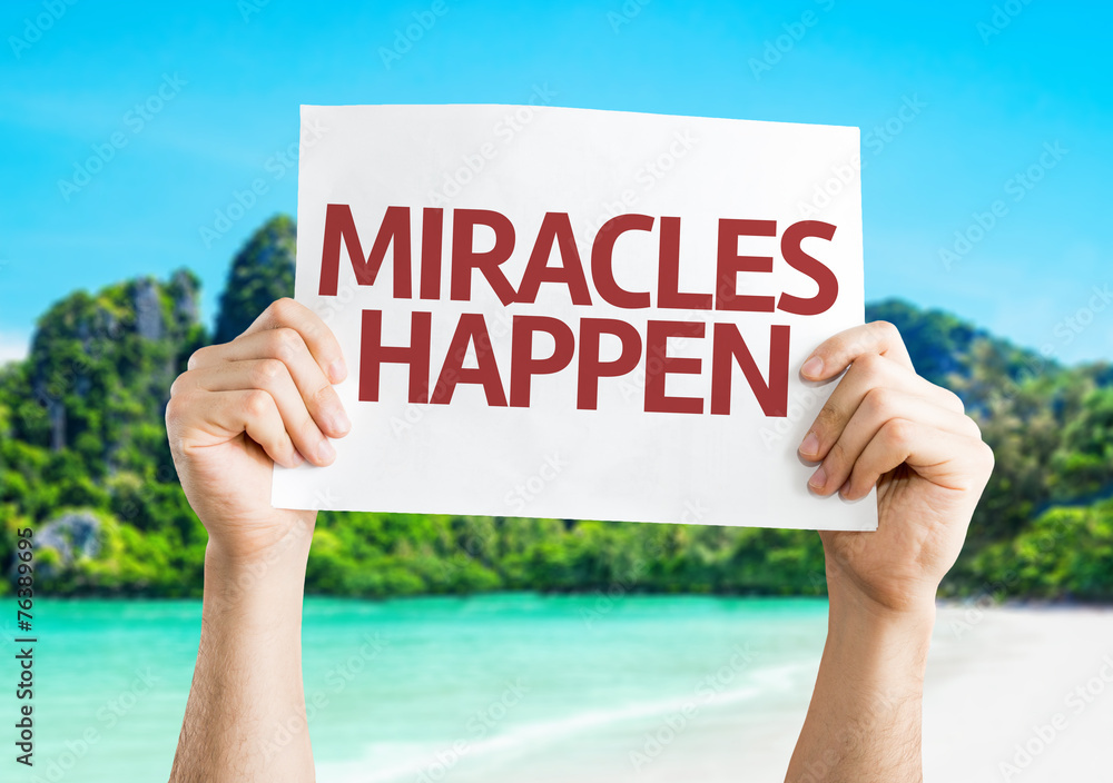 Miracles Happen card with a beach on background Miracles Happen card with a beach on background