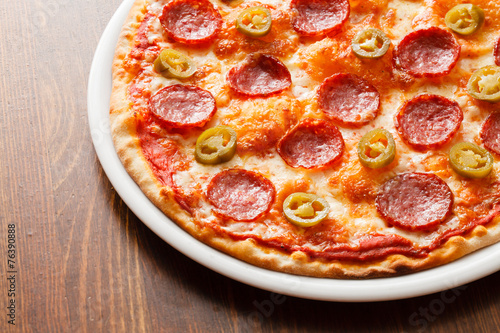 pizza on wood background