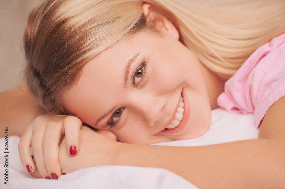 Beautiful woman waking up in the bed Beautiful woman waking up in the bed