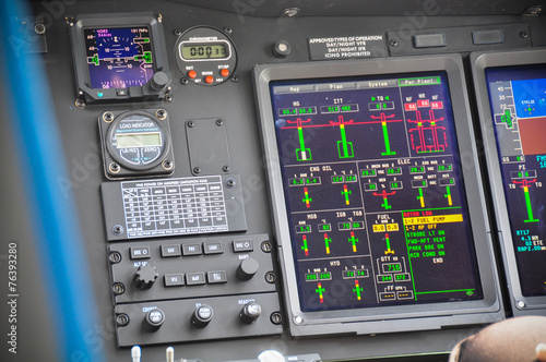 The pilots' control panel inside a passenger airplane © currahee_shutter