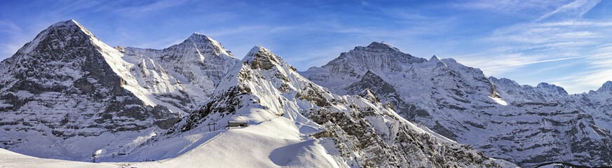 Foto auf Acrylglas Alpen Vier Alpengipfel und Skigebiet in den Schweizer Alpen  © Roman Babakin