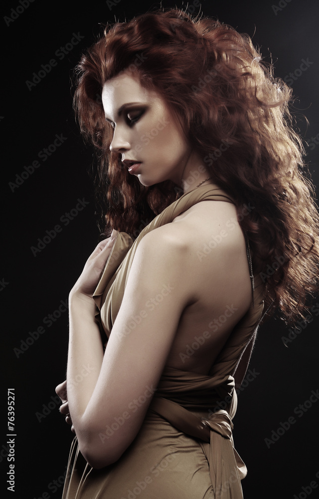 Naklejka premium woman with bright red curly hair