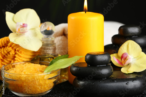Beautiful spa composition with candle and orchid